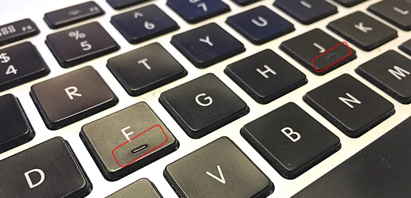 Dau nhan tren ban phim laptop 14